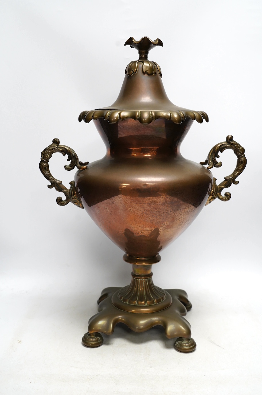 A Victorian copper and brass tea urn, 51cm. Condition - fair